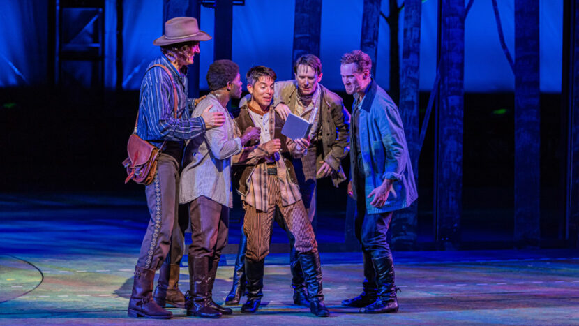 Actors from Seven Brides for Seven Brothers performing on stage