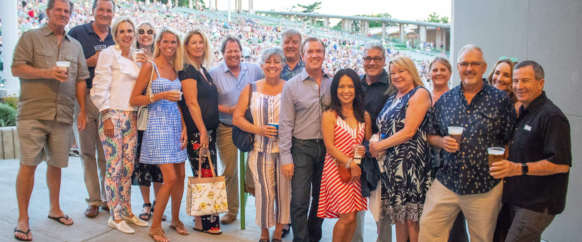 Group of people smiling before a show