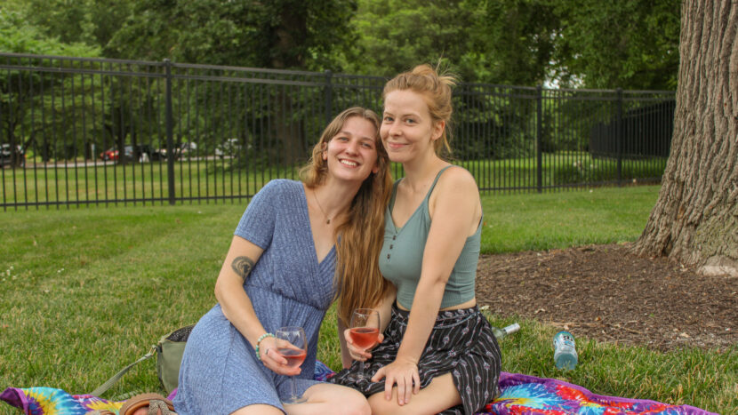 Two women having a picnic at the Purina Lawn