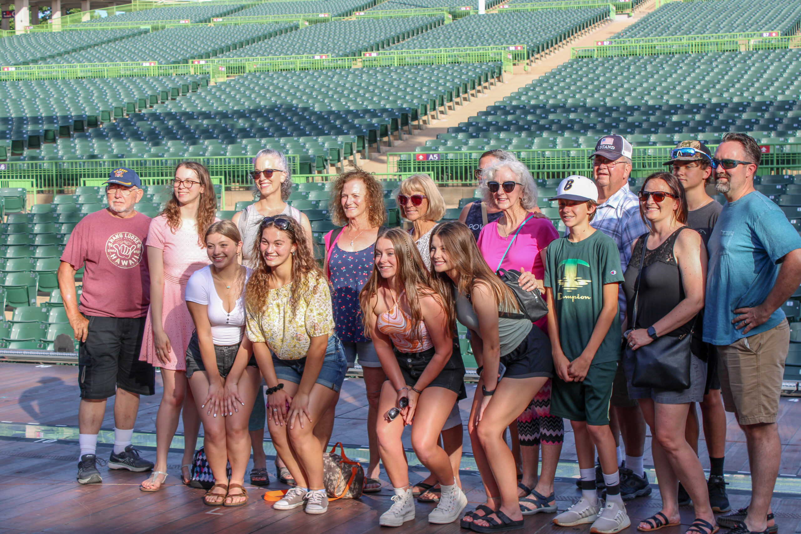 group photo of men, women and children before a show