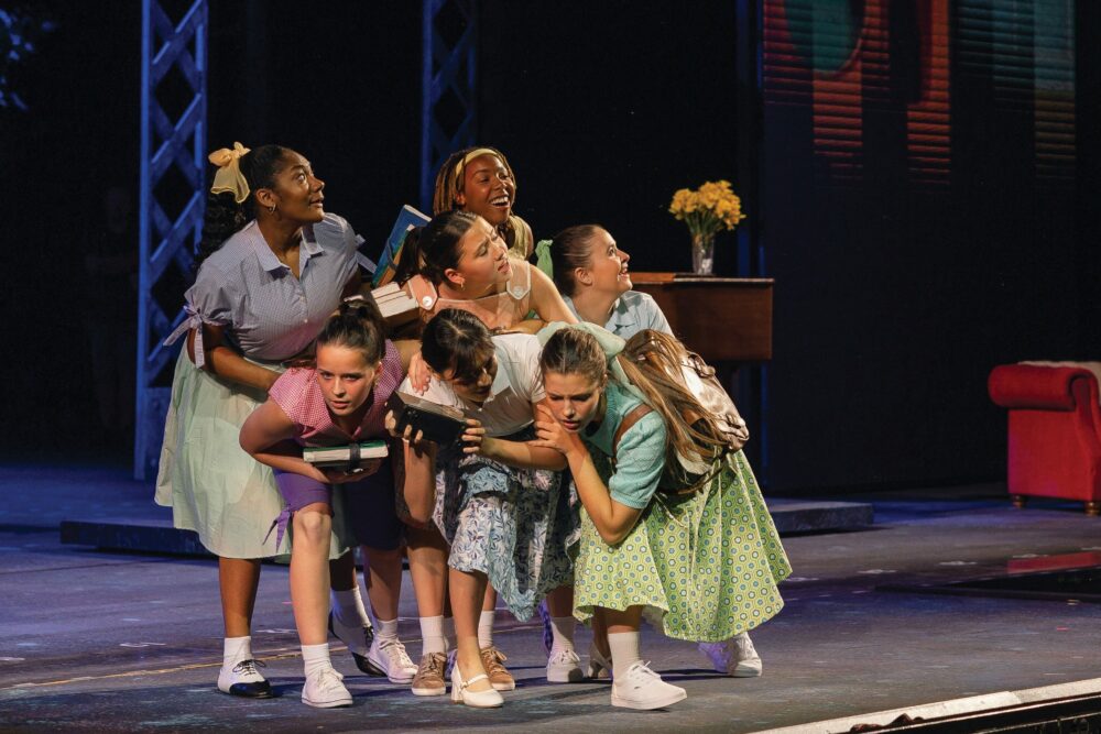 Leia Rhiannon Yogi (center) with other Youth Ensemble members in 2023’s 
Beautiful: The Carole King Musical. You will see her as Flounder this season in Disney’s The Little Mermaid, which runs July 8-16. 