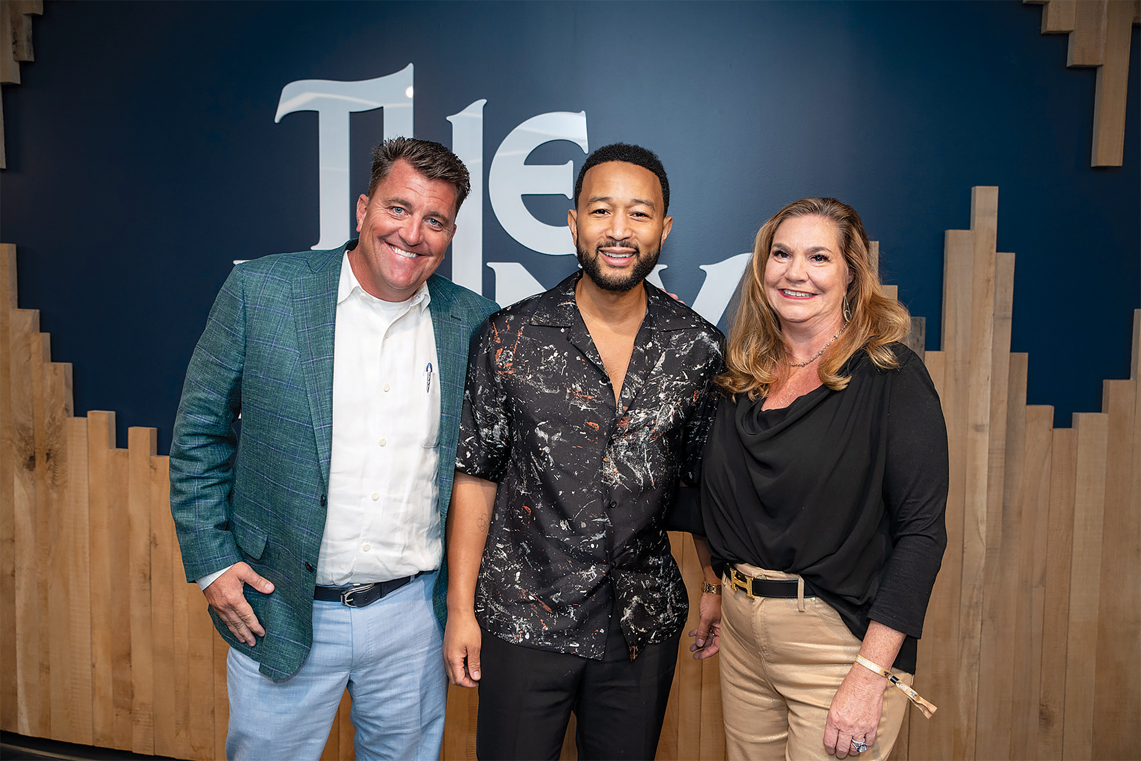 Stephanie Schnuck, pictured with Matthew McAuley (left) and John Legend, says she was thrilled to help bring concerts back to The Muny.