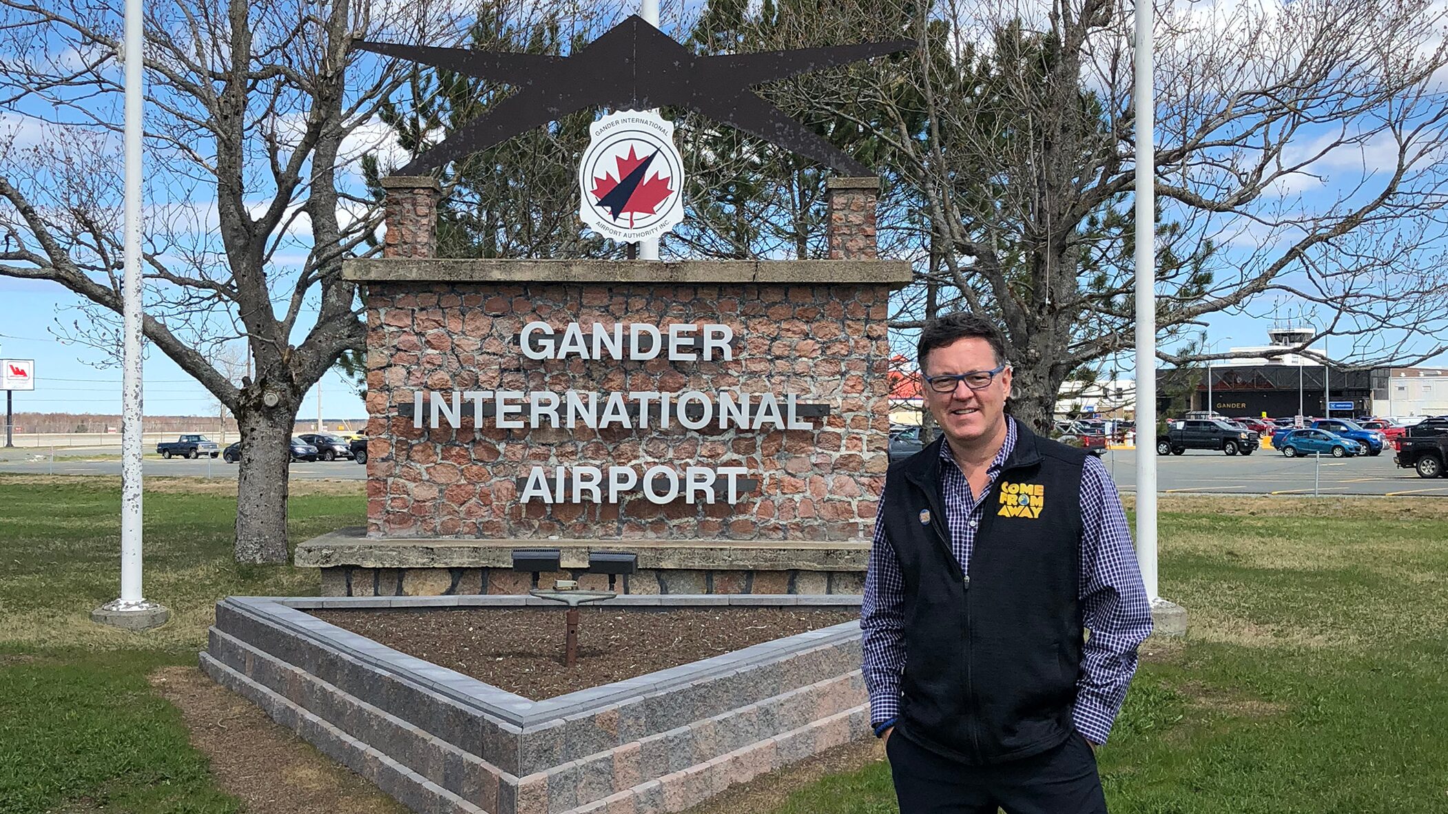 Kevin Tuerff stands in front of Gander International Airport