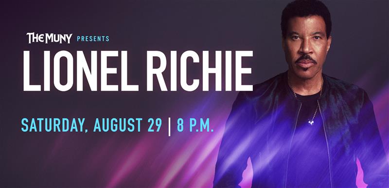 Concert promo image: The Muny presents Lionel Richie. Saturday, August 29 | 8 P.M. Lionel Richie stands on the right, facing forward at The Muny, with blue and purple light streaks in the foreground.